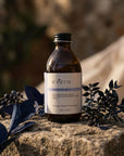 Evera Dark Shampoo No5 in a natural botanical setting