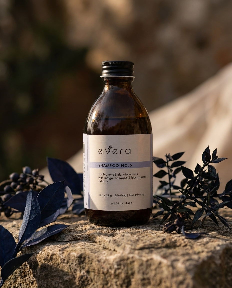 Evera Dark Shampoo No5 in a natural botanical setting
