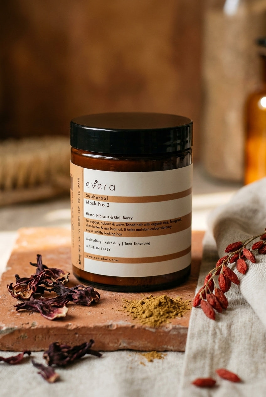 Evera Mask No 3 Supherbal Copper Auburn with hibiscus and henna on terracotta tile, umber backdrop