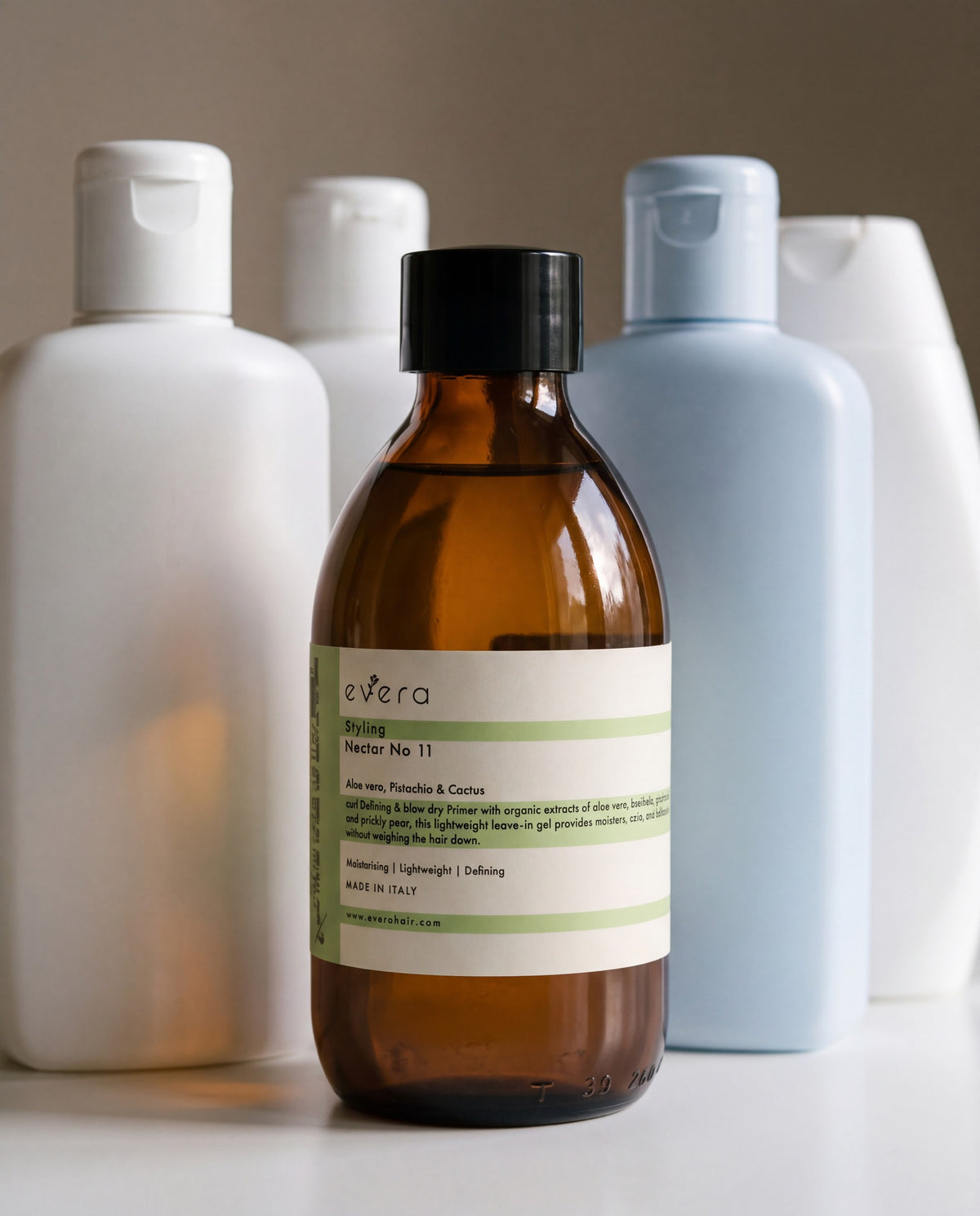 Evera Styling Nectar No. 11 — beside ordinary supermarket bottles