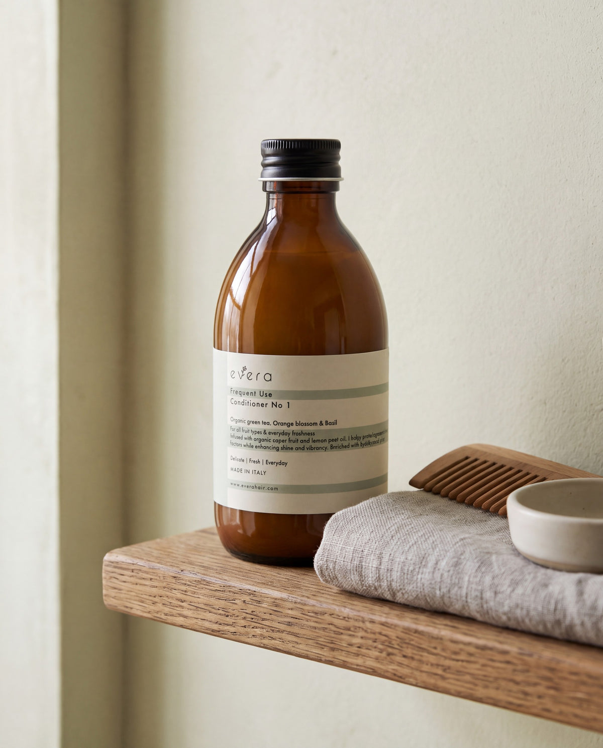 Frequent Use Conditioner N1 — on a shelf, shown to scale