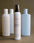 Mousse No.10 — beside ordinary supermarket bottles