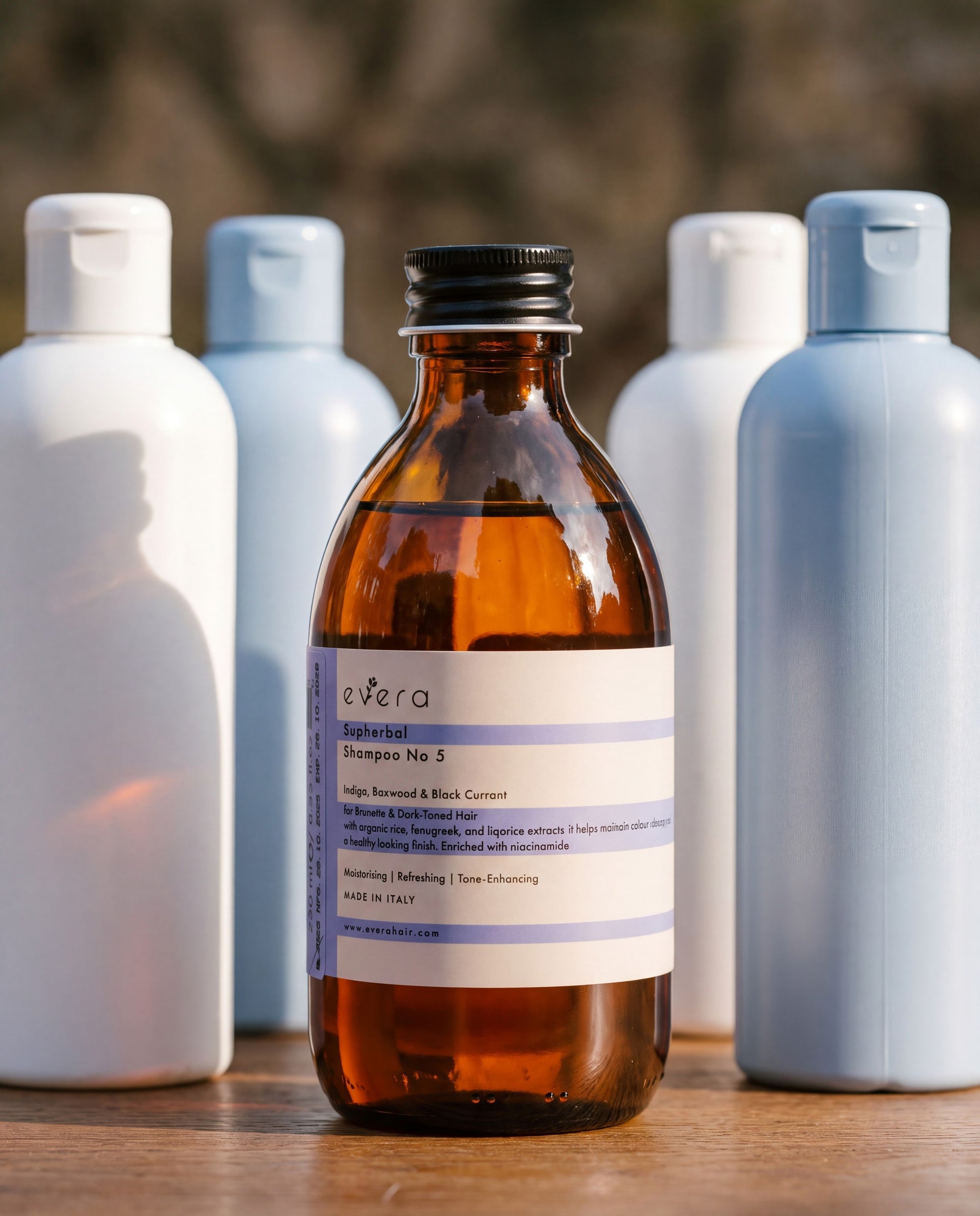 Supherbal Shampoo No.5 — beside ordinary supermarket bottles